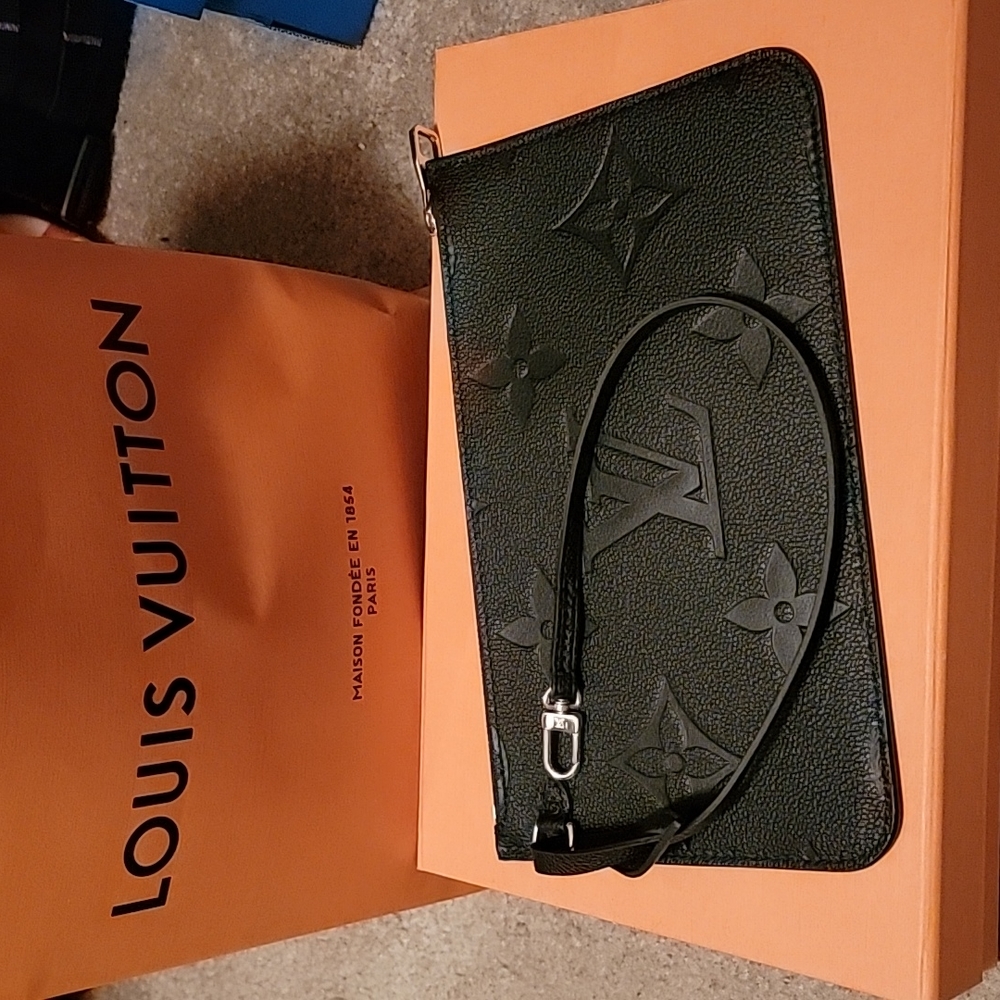 Black Empreinte Pochette from Monogram Giant Neverfull MM w/ wrist strap